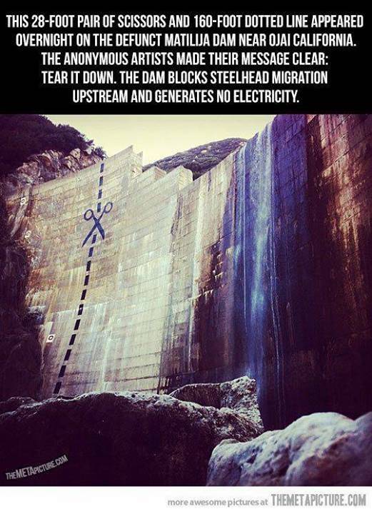 This 28 foot pair of scissors and 160 foot dotted line appeared overnight on the defunct matilija dam near Ojai California.